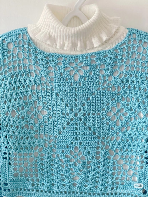 Ажурный голубой жилет крючком — лёгкость, стиль и индивидуальность