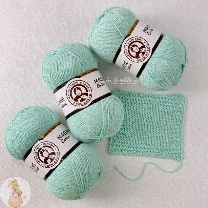 ​Ажурная кофточка с рукавами, связанная спицами по мотивам модели от Drops