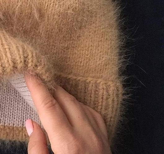 Шапка из пуха норки с подкладкой из мериноса.