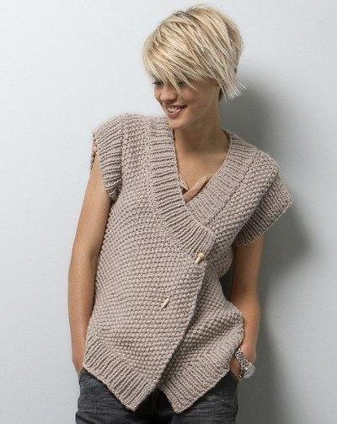 ​Серый женский жилет &laquo;На спице&raquo; &mdash; это лаконичная элегантность в каждой петле