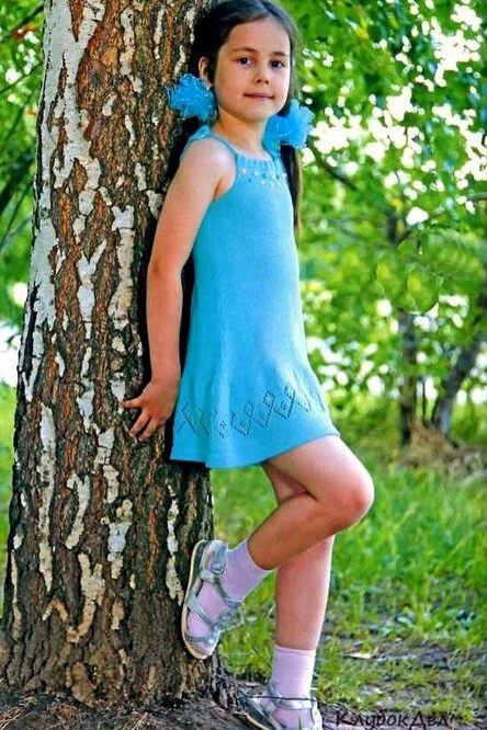 Сарафан бирюзового цвета.