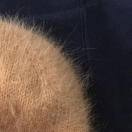 Описание шапки из пуха норки с подкладкой из мериноса