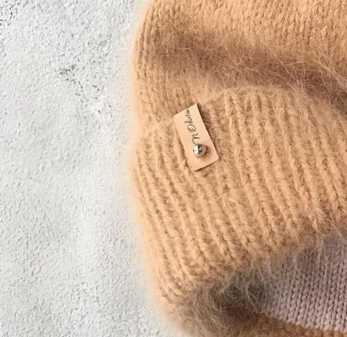 Описание шапки из пуха норки с подкладкой из мериноса